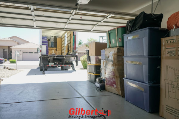 Items organized in customer garage and Gilbert Moving Truck
